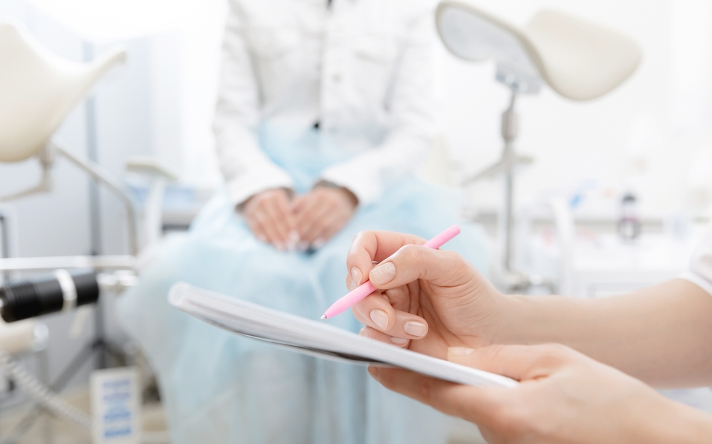 woman talking to gynecologist.